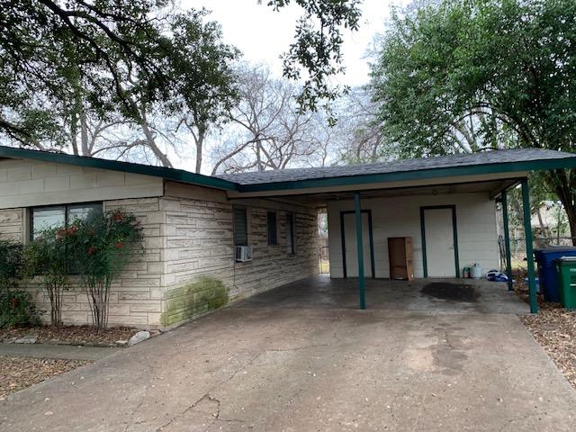 6000 Grover Avenue, Unit A Austin, TX 78757 - Photo 14 of 18 View of carport and laundry location. Each side has their own laundry room with W/D included