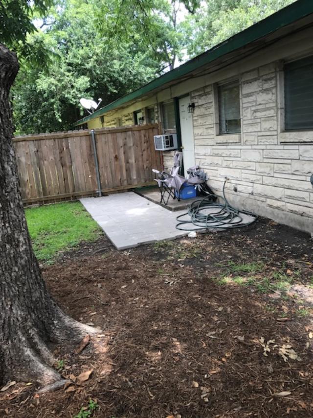 6000 Grover Avenue, Unit A Austin, TX 78757 - Photo 16 of 18 View of back yard featuring a patio area