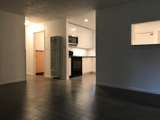 6000 Grover Avenue, Unit A Austin, TX 78757 - Photo 8 of 18 Looking from door towards kitchen and bedrooms