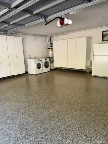 a wooden bench sitting in front of a building