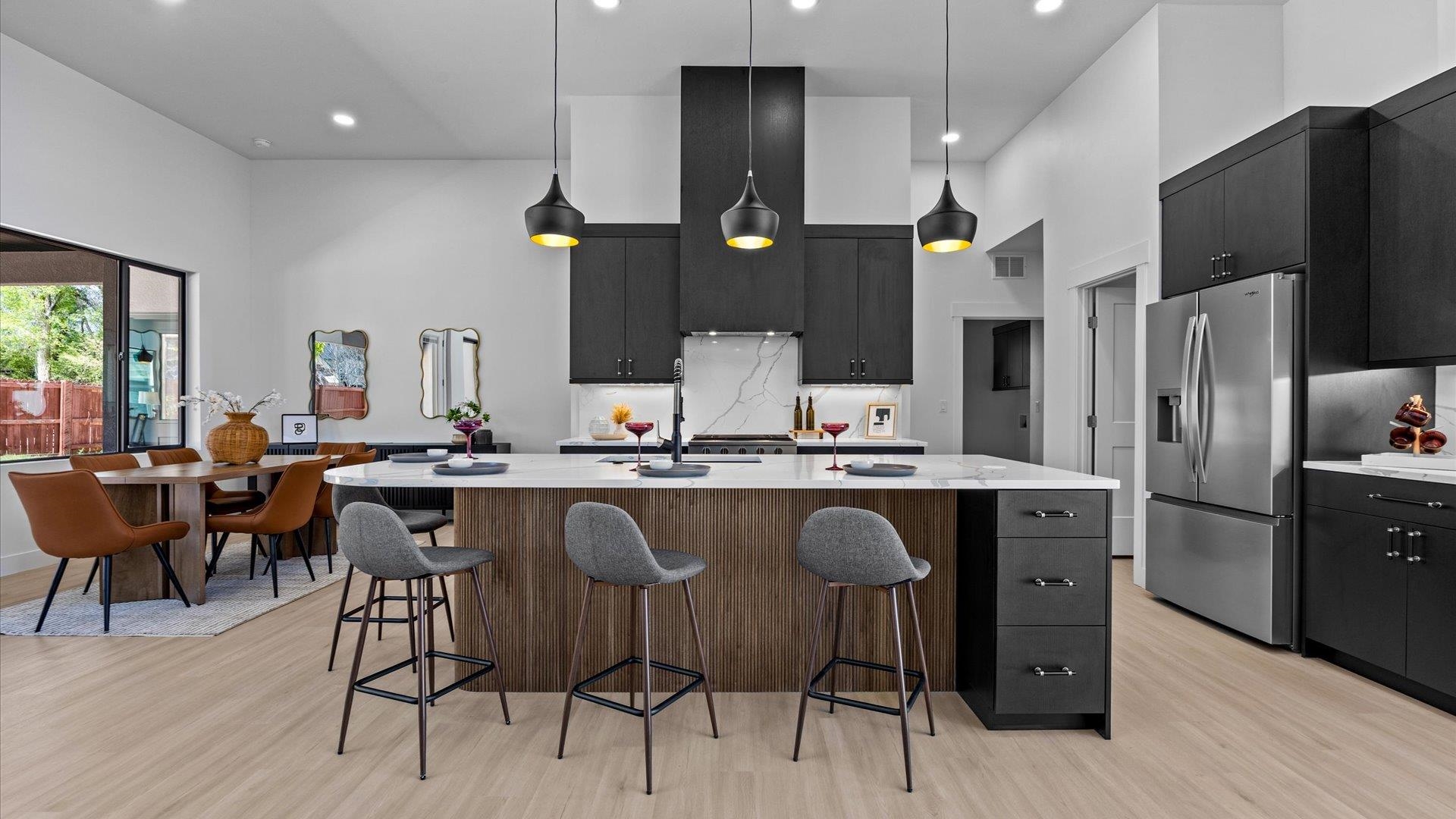 2045 Caleb Street Grand Junction, CO 81507 - Photo 11 of 42 a kitchen with a sink cabinets and stainless steel appliances