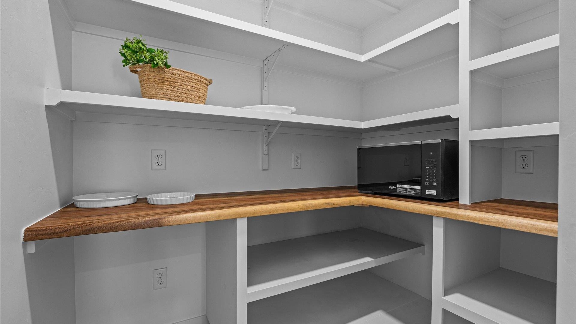 2045 Caleb Street Grand Junction, CO 81507 - Photo 16 of 42 a view of walk in closet with living room