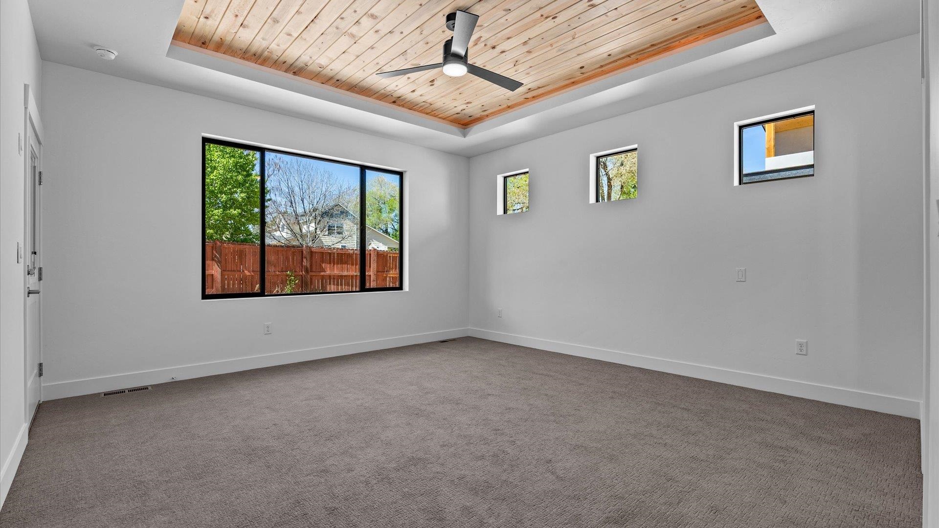 2045 Caleb Street Grand Junction, CO 81507 - Photo 17 of 42 an empty room with windows
