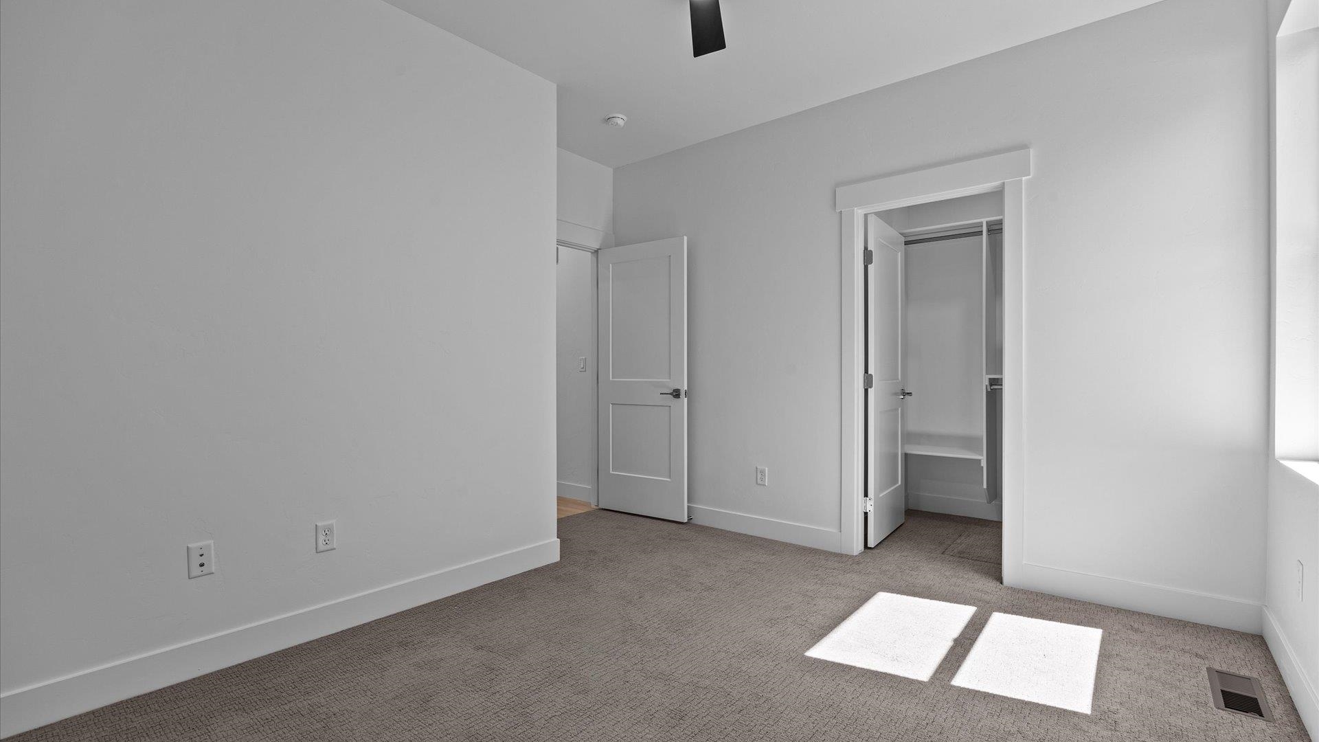 2045 Caleb Street Grand Junction, CO 81507 - Photo 28 of 42 an empty room with windows