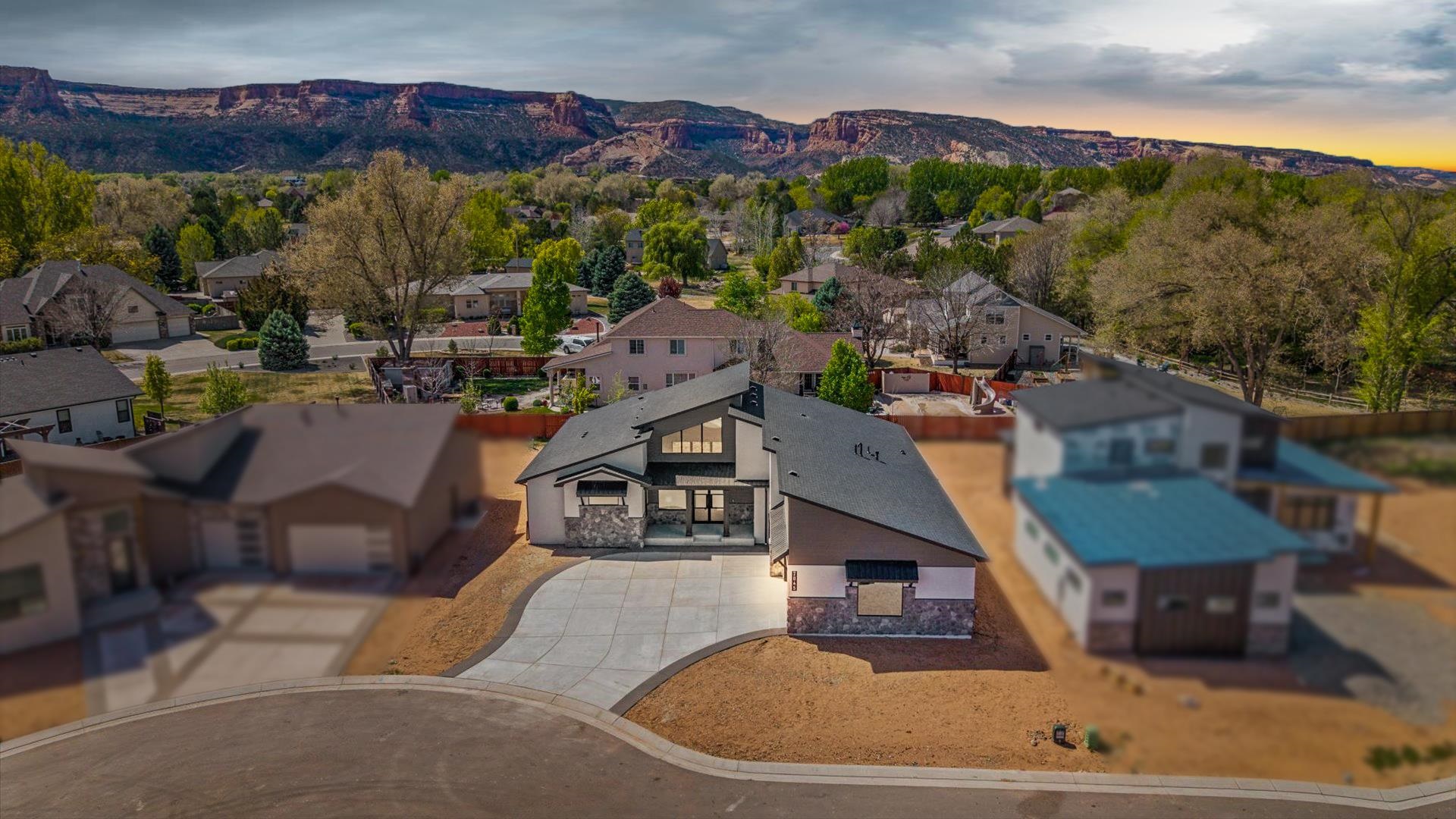 2045 Caleb Street Grand Junction, CO 81507 - Photo 39 of 42 a view of a house with pool and chairs