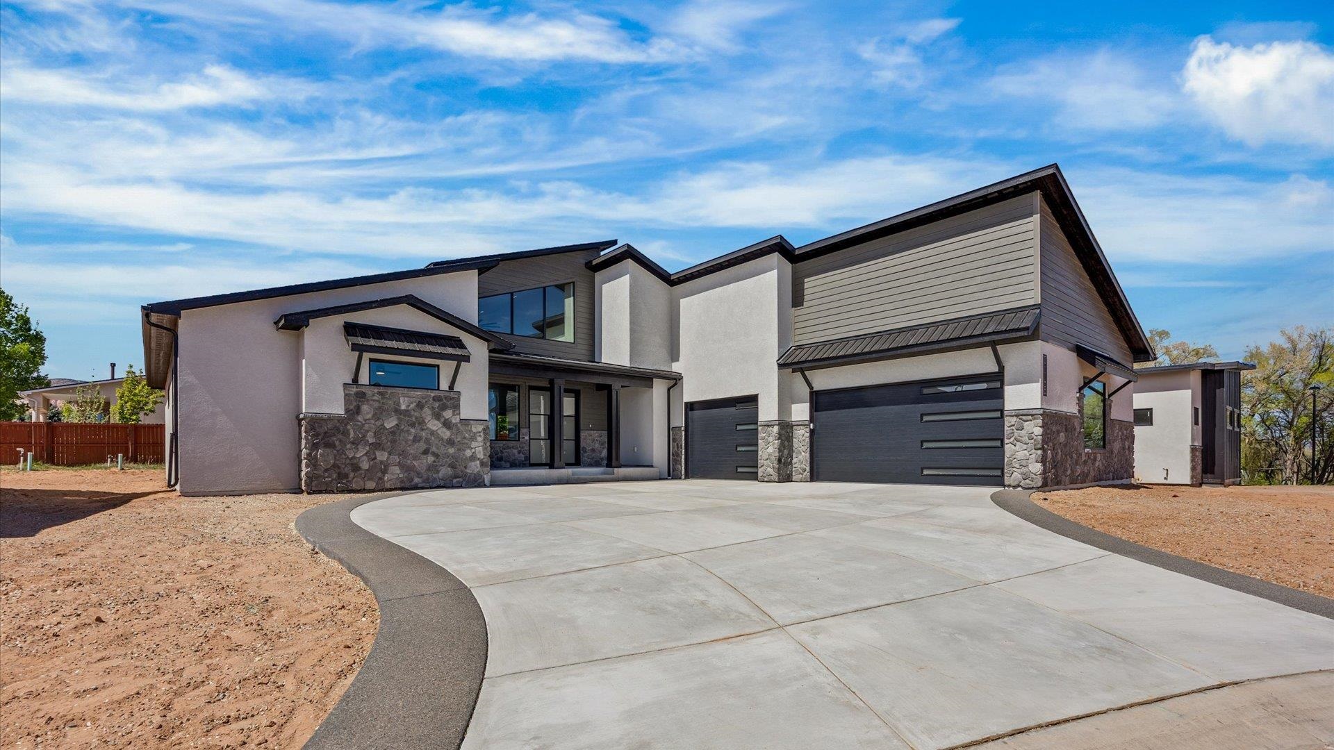 2045 Caleb Street Grand Junction, CO 81507 - Photo 40 of 42 a front view of a house with yard