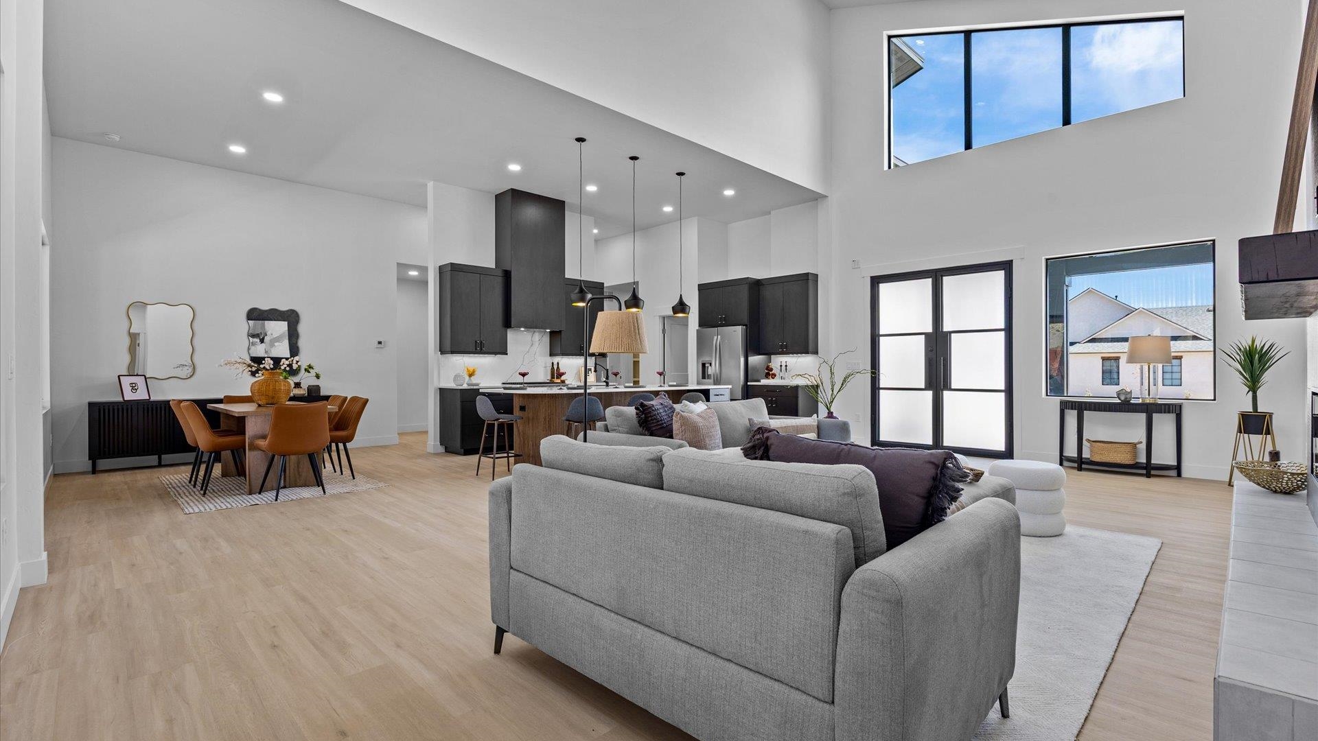 2045 Caleb Street Grand Junction, CO 81507 - Photo 7 of 42 a living room with furniture and a wooden floor