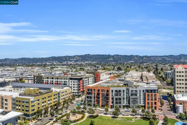 a view of a city with tall buildings