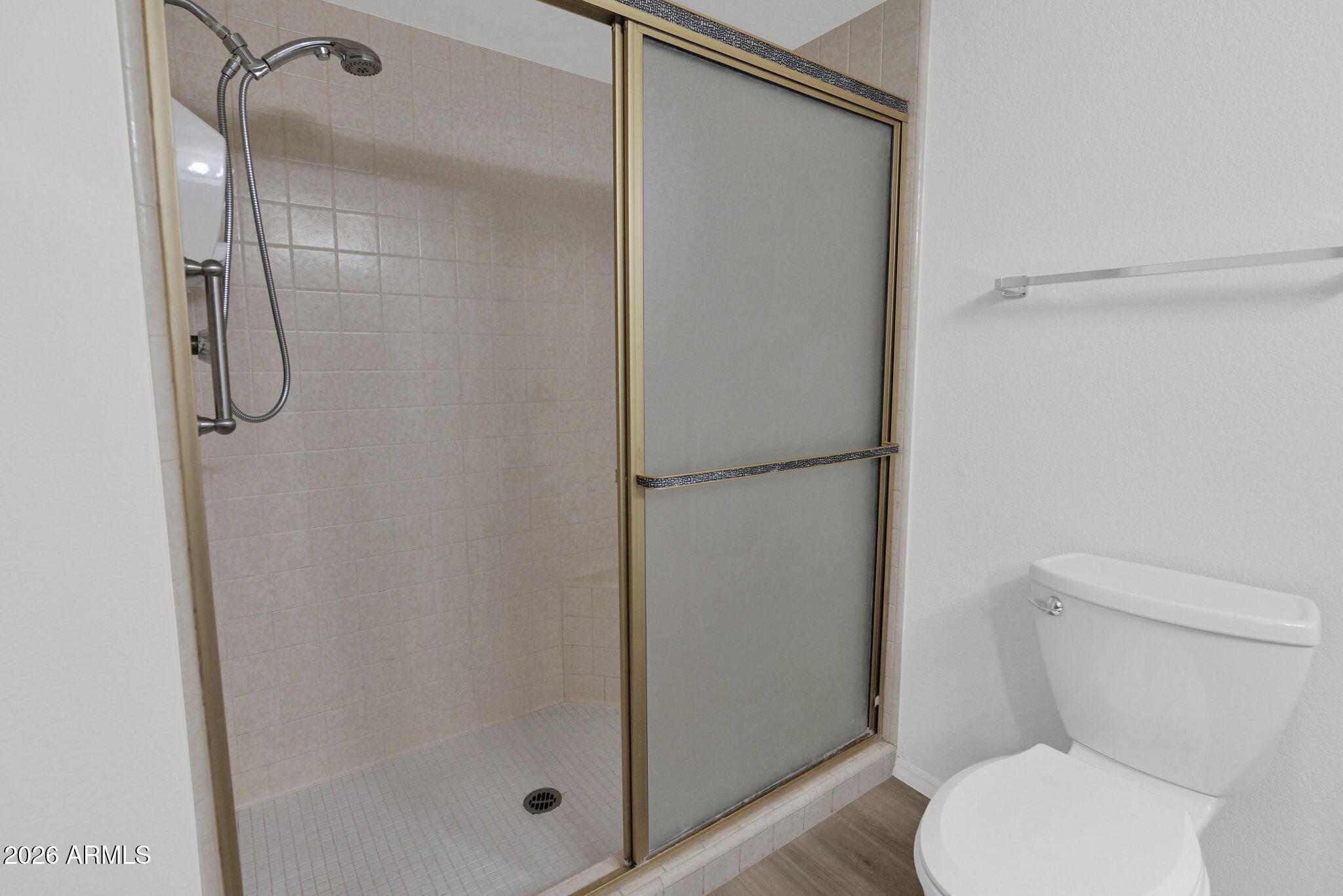 507 West Knox Road Chandler, AZ 85225 - Photo 16 of 34 a white toilet sitting next to a shower