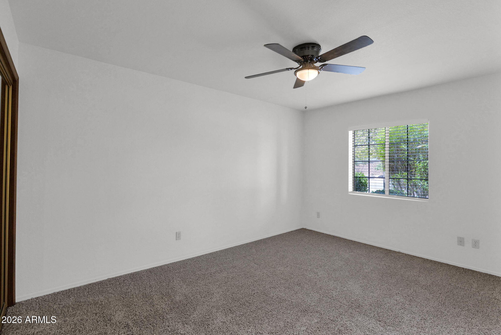 507 West Knox Road Chandler, AZ 85225 - Photo 17 of 34 a view of a livingroom with a ceiling fan and window