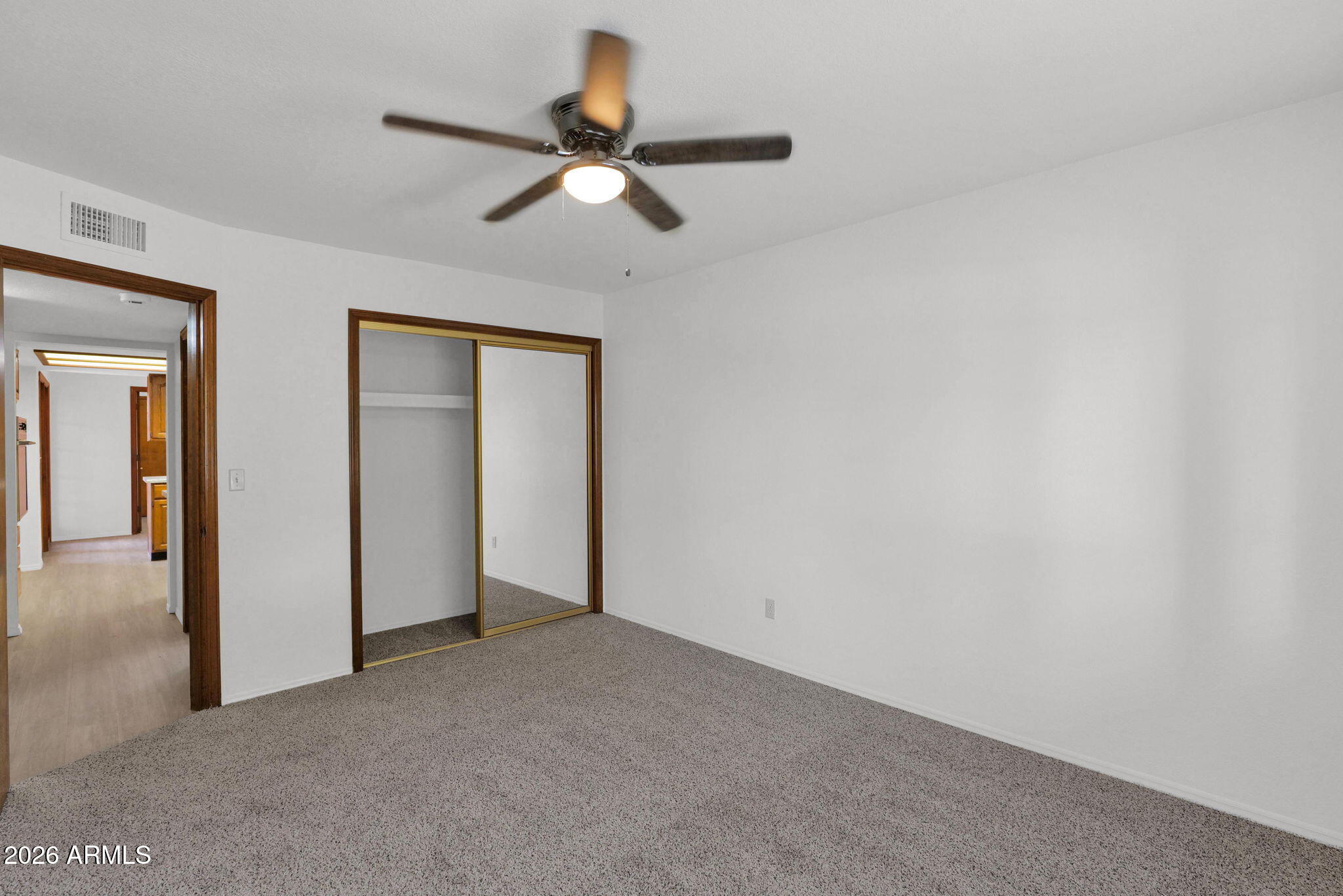 507 West Knox Road Chandler, AZ 85225 - Photo 18 of 34 a view of a livingroom with a ceiling fan and window