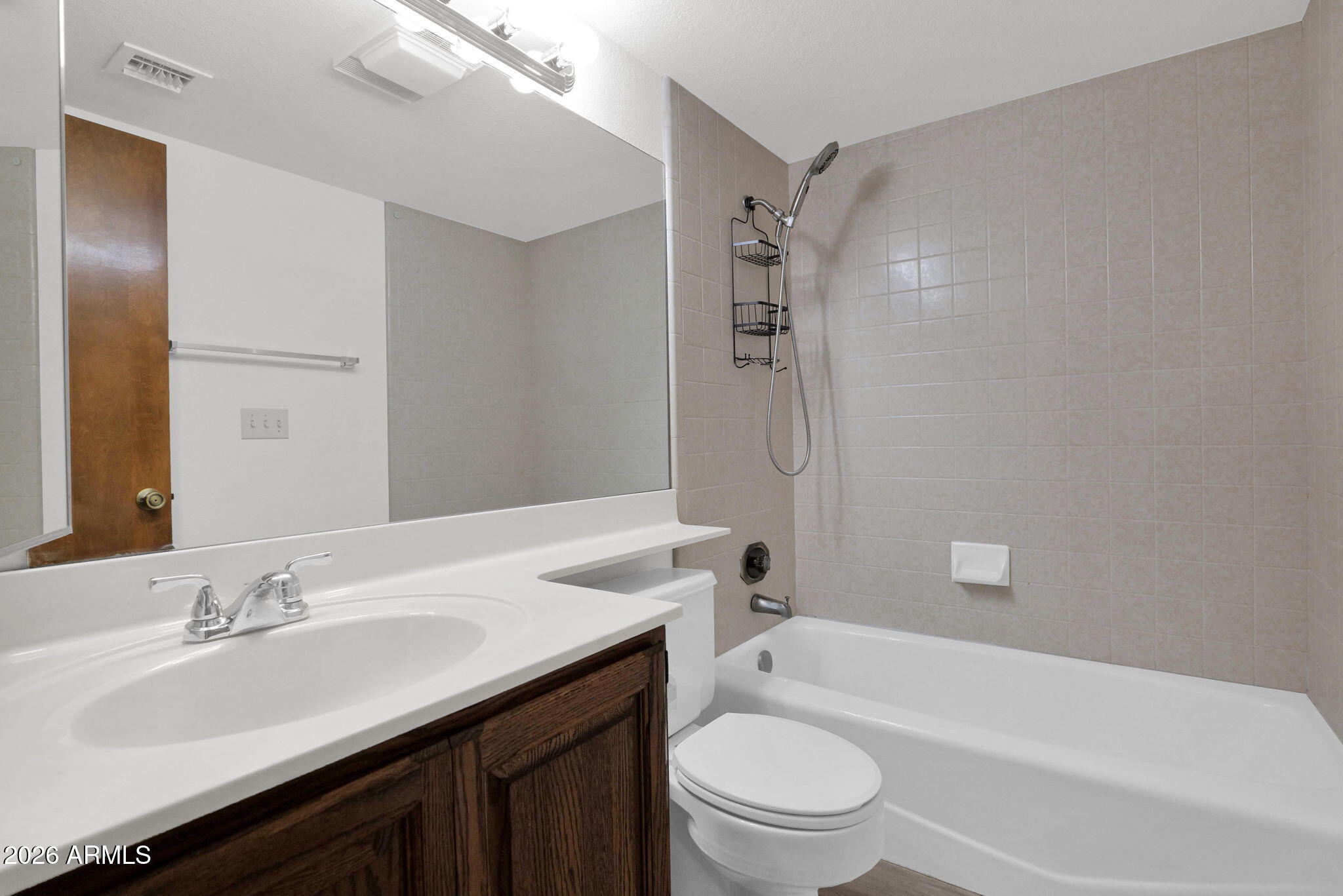507 West Knox Road Chandler, AZ 85225 - Photo 19 of 34 a bathroom with a granite countertop sink toilet and shower