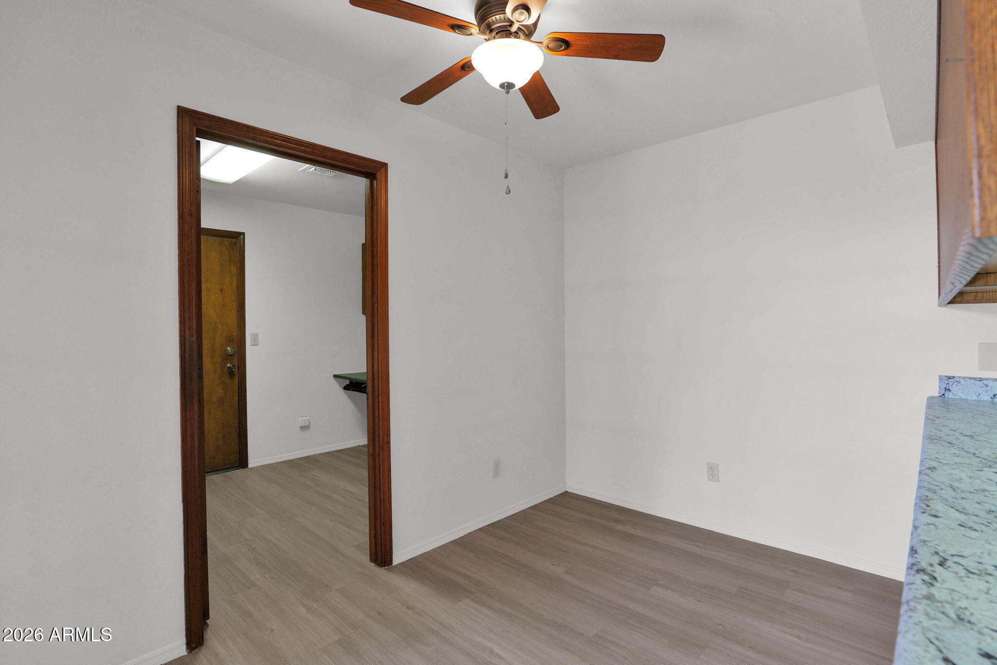 507 West Knox Road Chandler, AZ 85225 - Photo 20 of 34 a view of an empty room with wooden floor