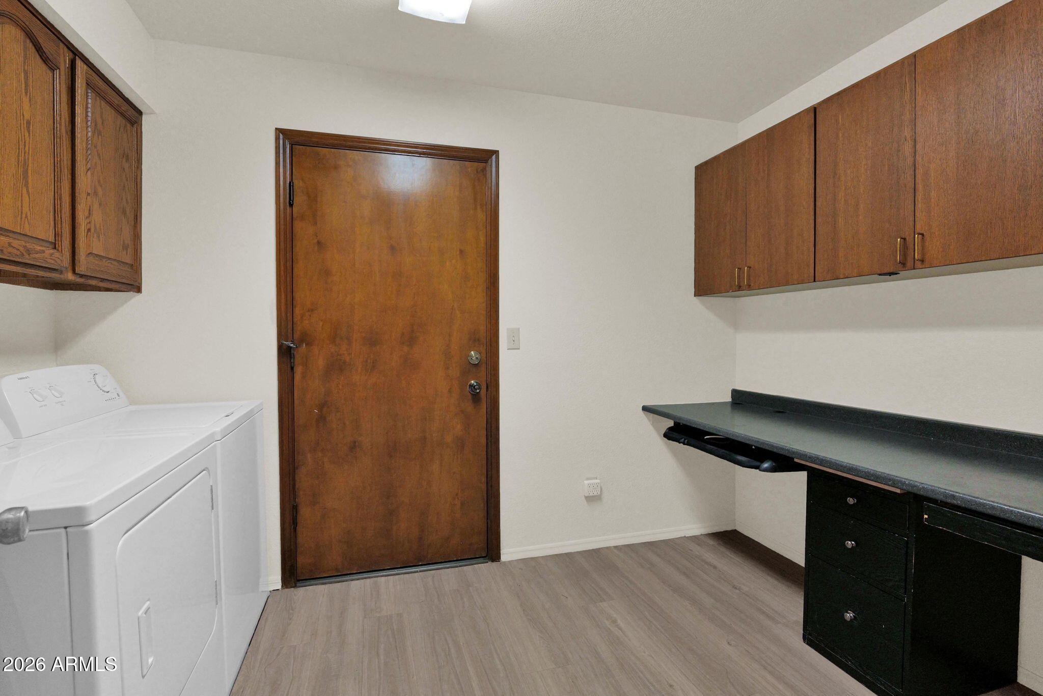 507 West Knox Road Chandler, AZ 85225 - Photo 21 of 34 a room with cabinets and wooden floor