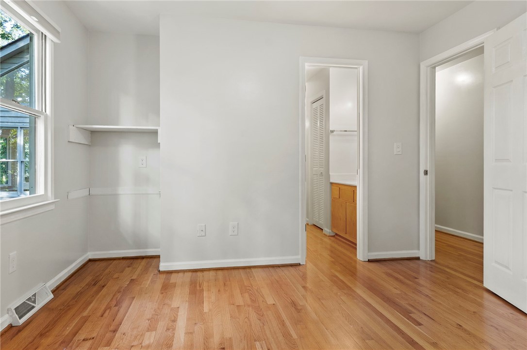 225 Arrowhead Trail Easley, SC 29642 - Photo 19 of 33 This airy bedroom offers rich hardwood floors, an inviting space ready for your personal touch.