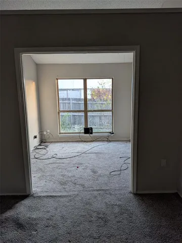 a room with a bench and a sink