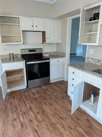 a bathroom with a toilet a sink and a bathtub