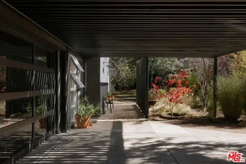 a view of garage with wooden floor