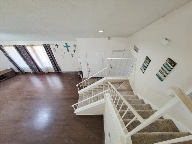 a view of a livingroom with furniture
