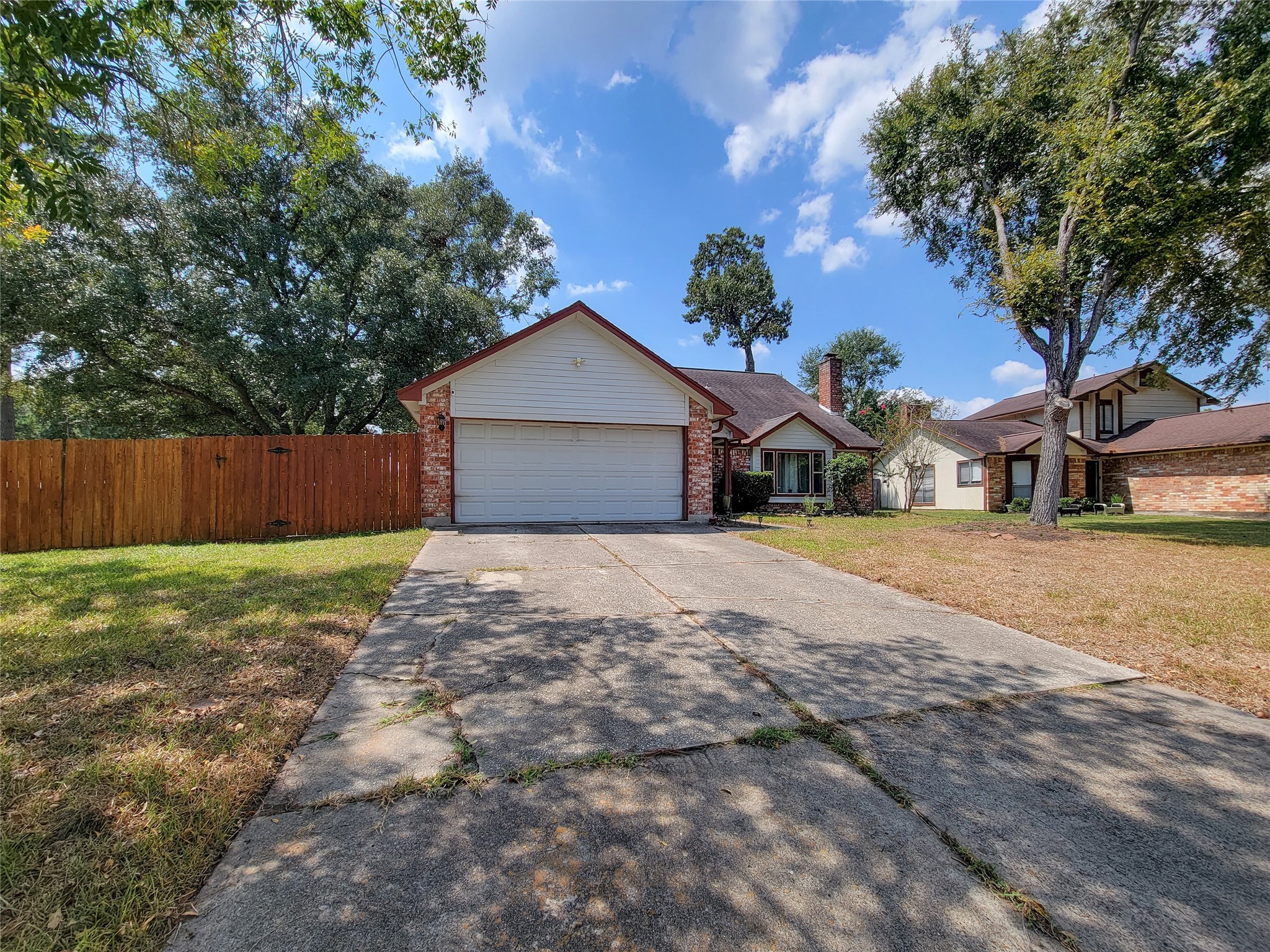 25303 Avery Hill Lane Spring, TX 77373 - Photo 2 of 20 front view of a house with a yard