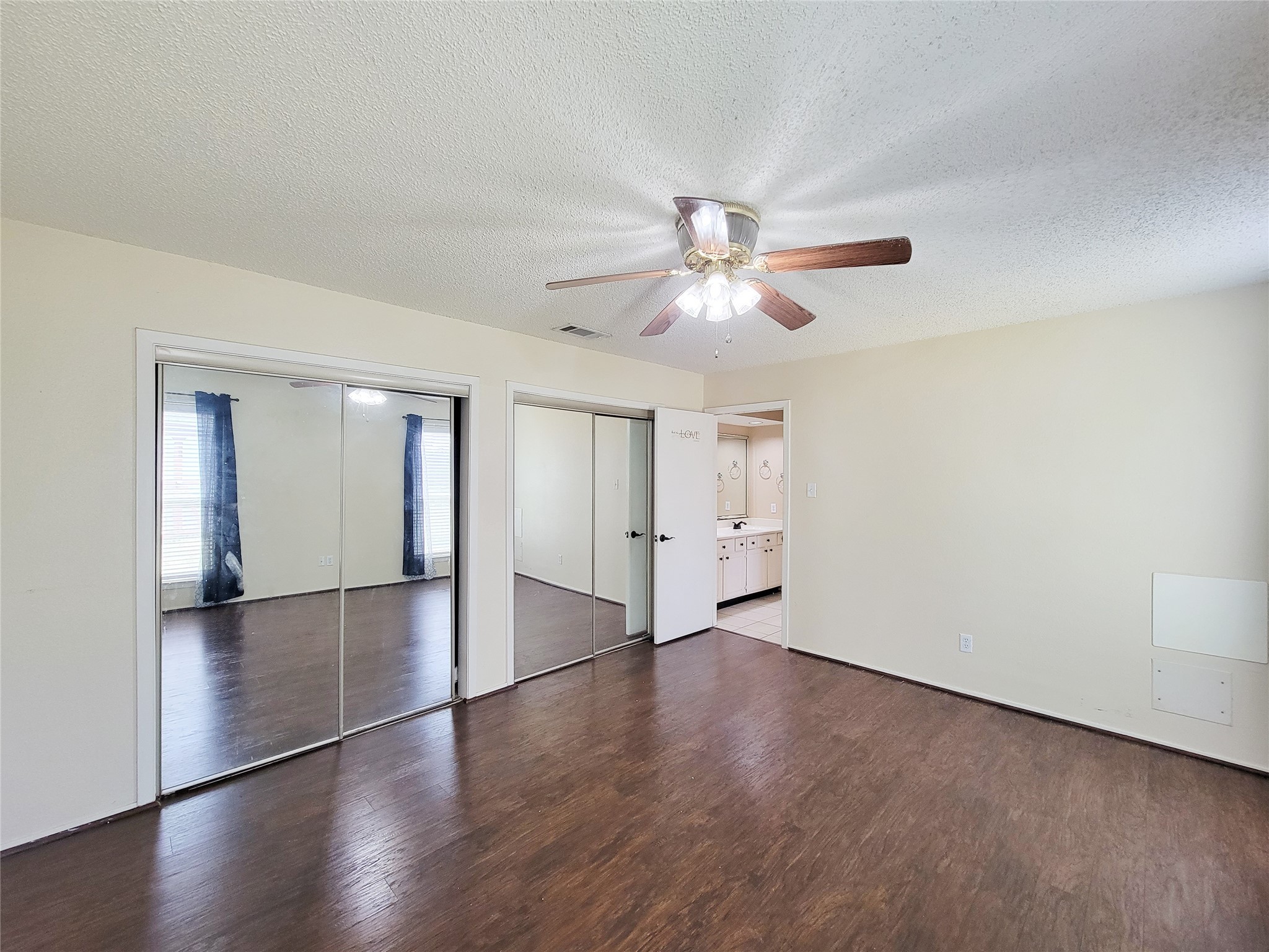 25303 Avery Hill Lane Spring, TX 77373 - Photo 10 of 20 a view of an empty room with wooden floor