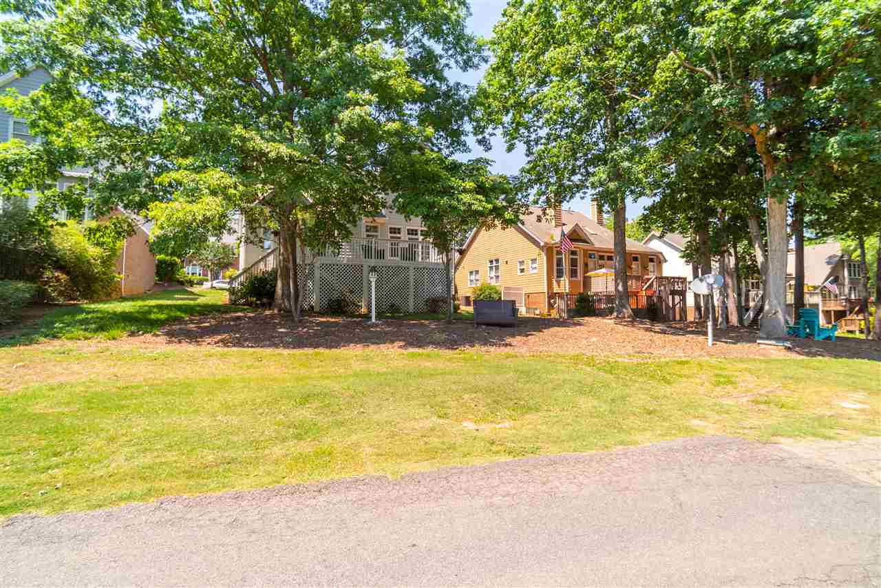 10101 Goodview Court Raleigh, NC 27613 - Photo 28 of 30 Exterior view from the fairway