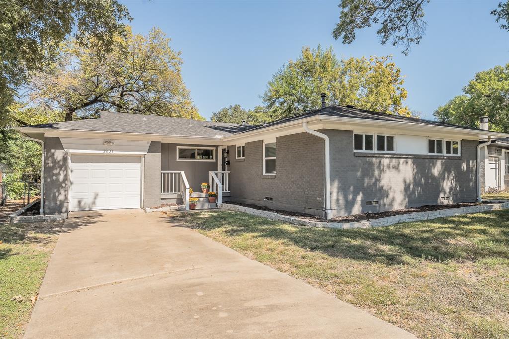 3031 Woodwind Lane Dallas, TX 75229 - Photo 2 of 29 a view of a house with a patio