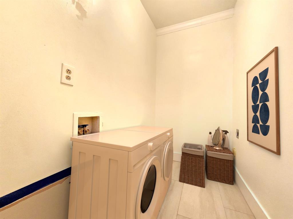 3031 Woodwind Lane Dallas, TX 75229 - Photo 26 of 29 a utility room with dryer and washer
