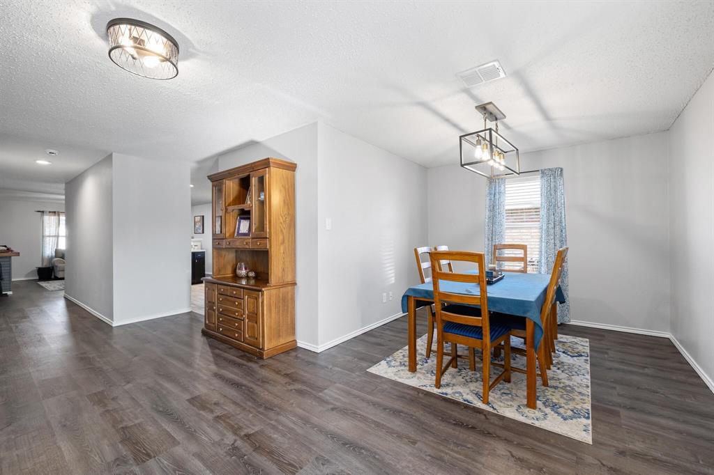 2705 Mitchell Lane Anna, TX 75409 - Photo 11 of 24 a view of a workspace with furniture and wooden floor