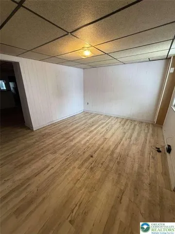 a view of a hallway with front door