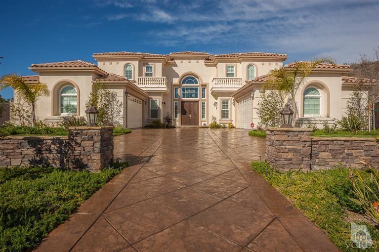 7351 Sarazen Drive Moorpark, CA 93021 - Photo 1 of 39 a front view of a house with a yard