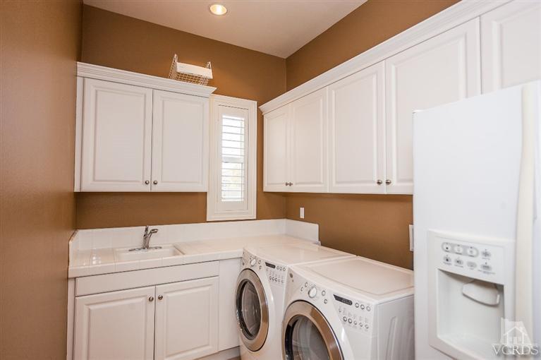 7351 Sarazen Drive Moorpark, CA 93021 - Photo 20 of 39 a utility room with dryer and washer
