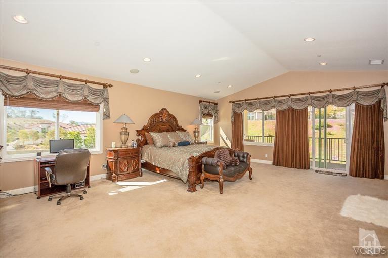 7351 Sarazen Drive Moorpark, CA 93021 - Photo 21 of 39 a bedroom with furniture and a large window