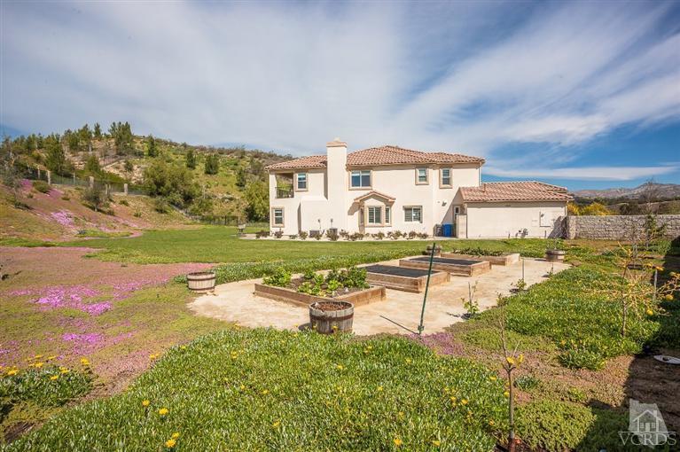 7351 Sarazen Drive Moorpark, CA 93021 - Photo 32 of 39 a swimming pool with outdoor seating and yard