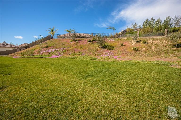 7351 Sarazen Drive Moorpark, CA 93021 - Photo 33 of 39 a view of a large body of water with a building in the background