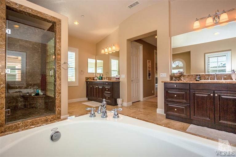7351 Sarazen Drive Moorpark, CA 93021 - Photo 6 of 39 a bathroom with a sink double vanity