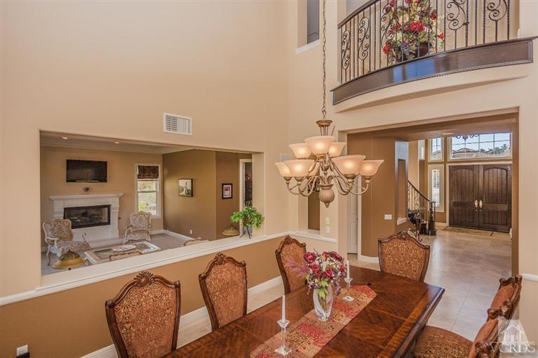 7351 Sarazen Drive Moorpark, CA 93021 - Photo 10 of 39 a bedroom with furniture and a fireplace