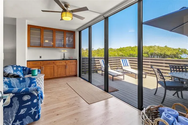 a balcony view with a seating space