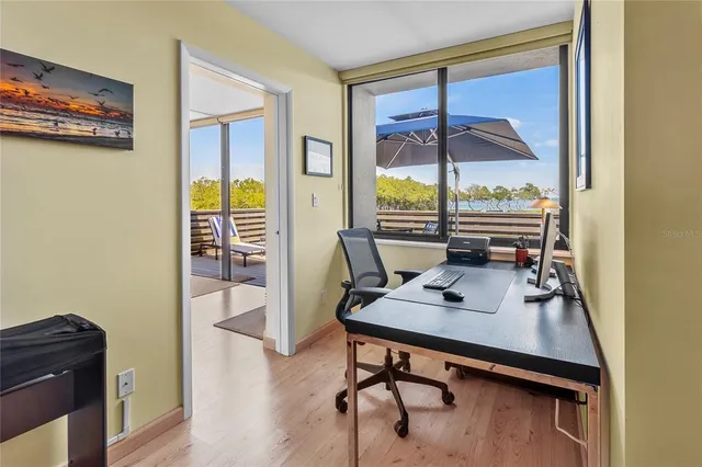 a view of a swimming pool with a yard