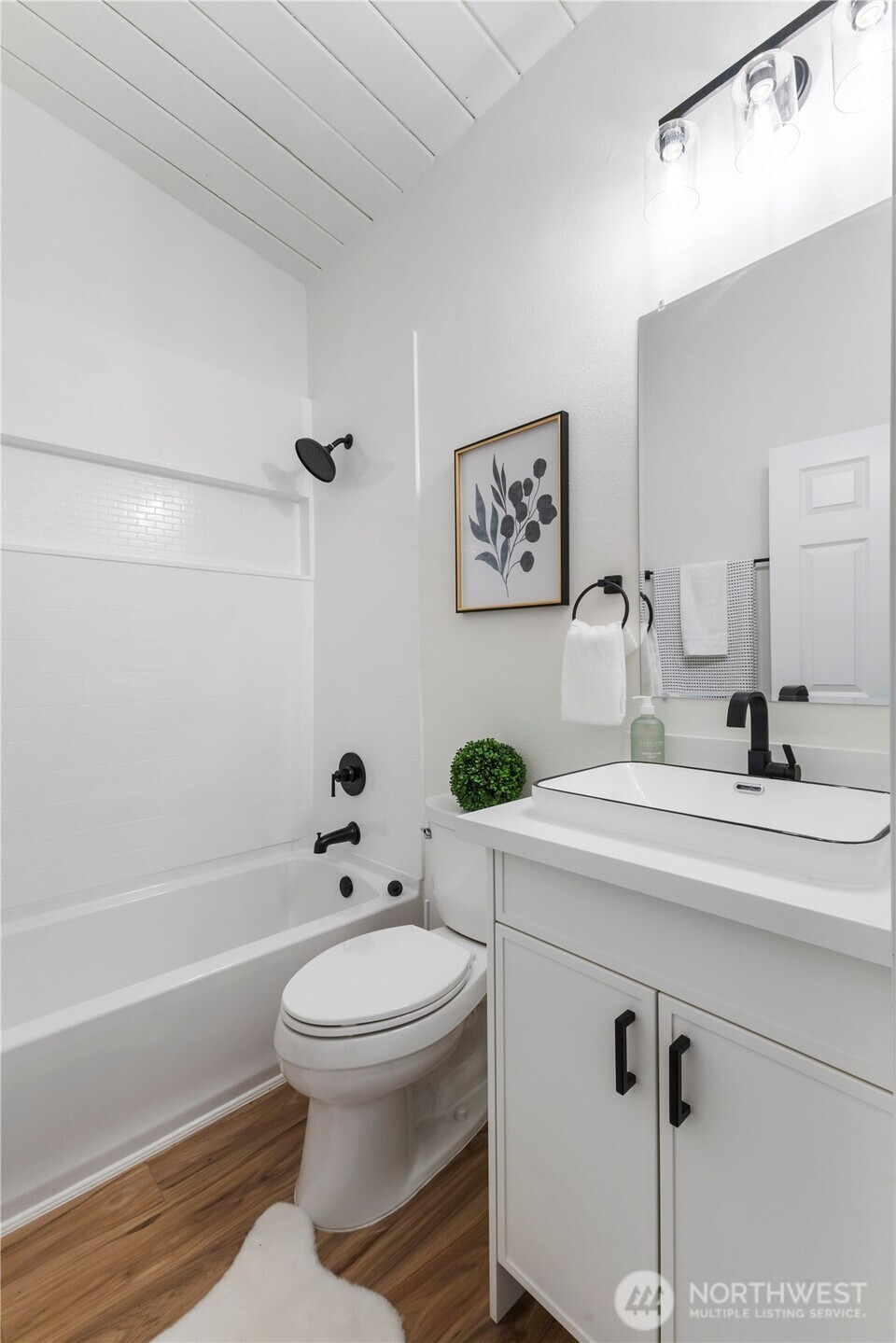 35631 13th Avenue Southwest Federal Way, WA 98023 - Photo 21 of 27 a bathroom with a sink a toilet and shower