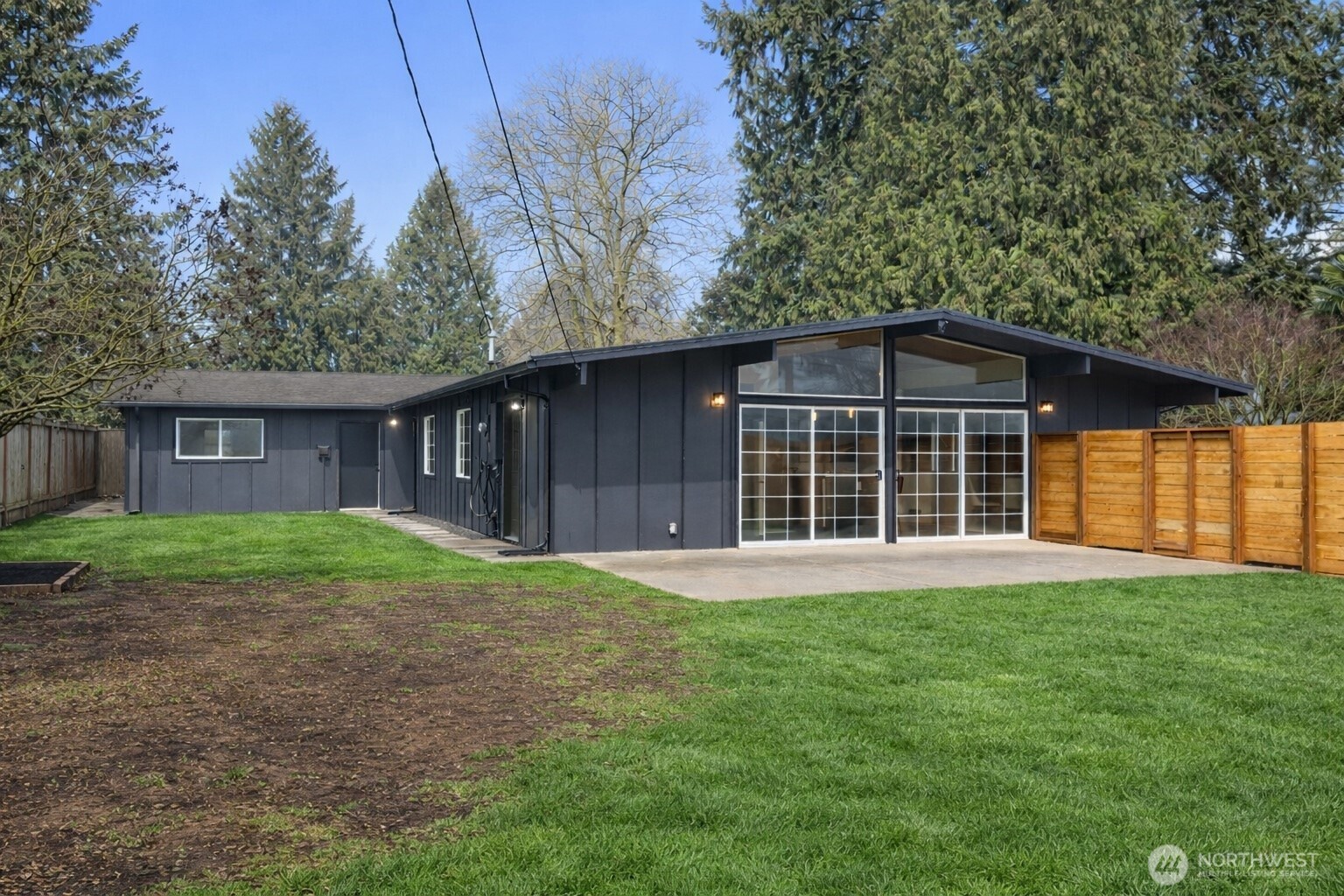35631 13th Avenue Southwest Federal Way, WA 98023 - Photo 27 of 27 a view of a yard in front of a house with large tree