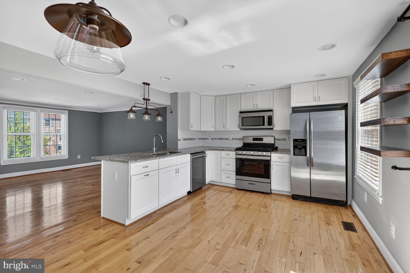 43983 Choptank Terrace Ashburn, VA 20147 - Photo 6 of 21 Modern kitchen with sleek finishes.