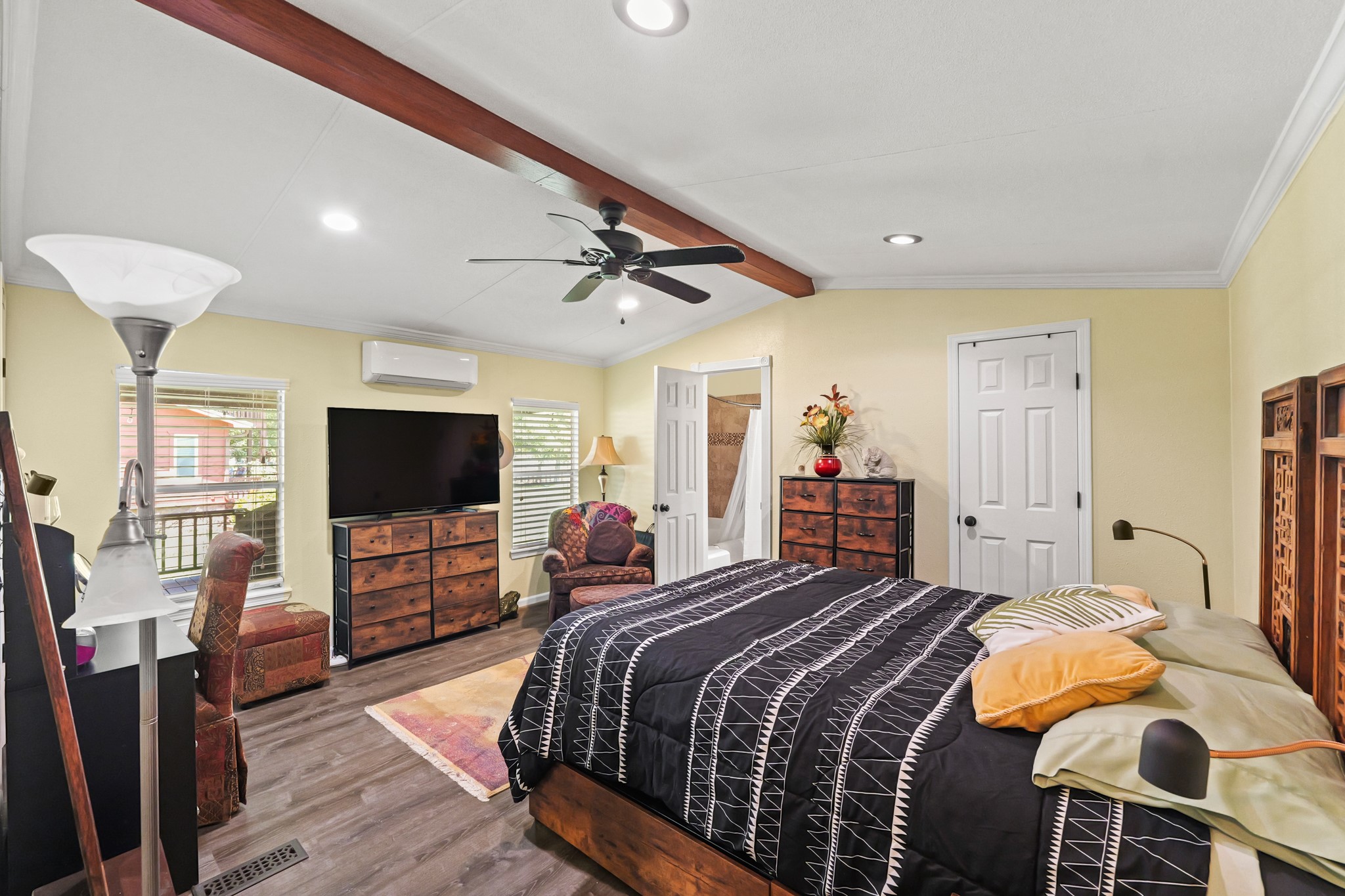 729 Lake Shore Drive Trinity, TX 75862 - Photo 20 of 38 a bedroom with a bed and a flat screen tv