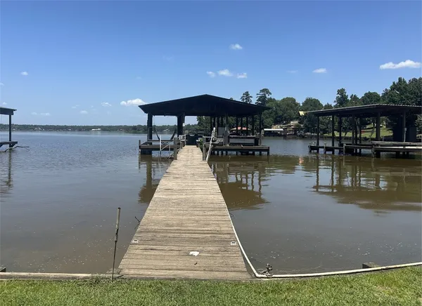 a view of a lake with sitting area