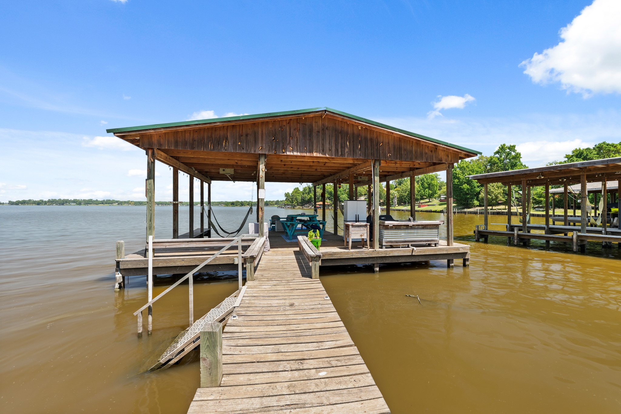 729 Lake Shore Drive Trinity, TX 75862 - Photo 9 of 38 a view of a swimming pool with lounge chairs
