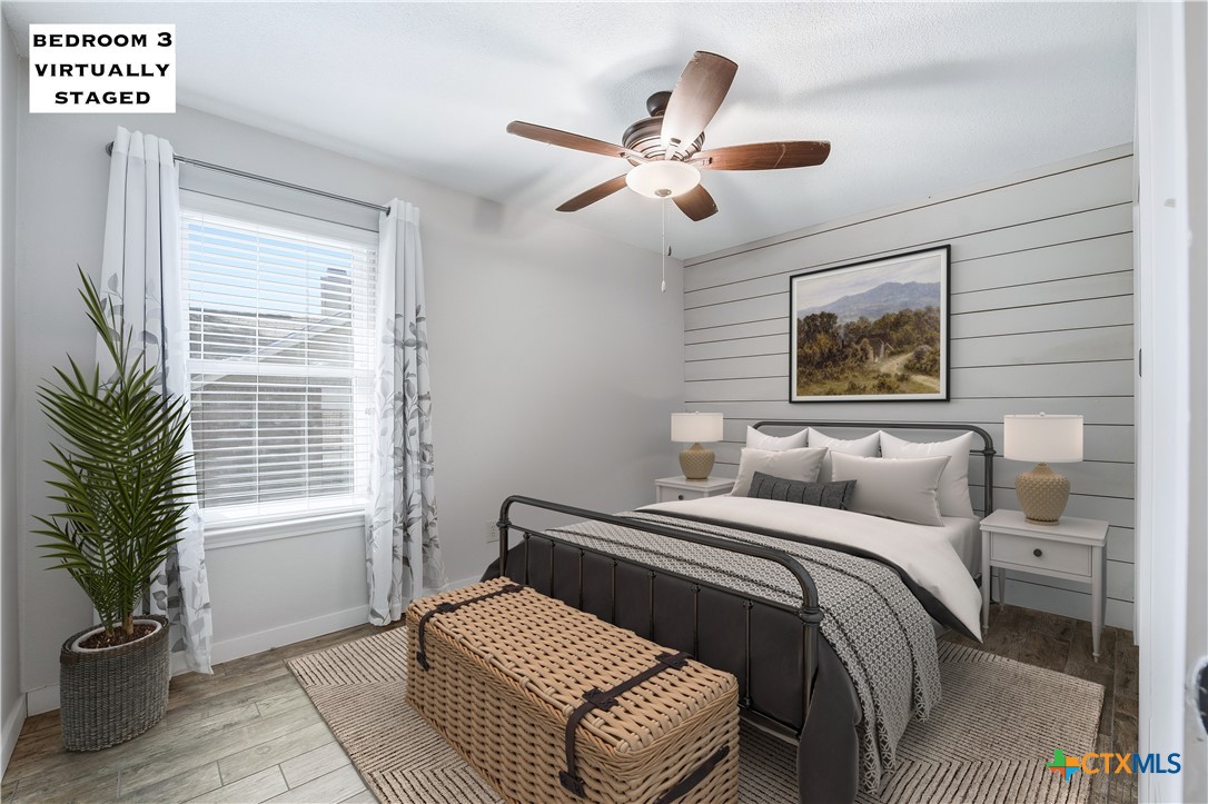 3624 Fox Run Schertz, TX 78108 - Photo 27 of 46 a bedroom with a large bed and a window