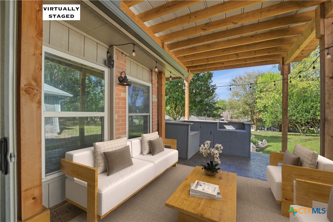 3624 Fox Run Schertz, TX 78108 - Photo 31 of 46 a view of a patio with couches chairs and a table and chairs