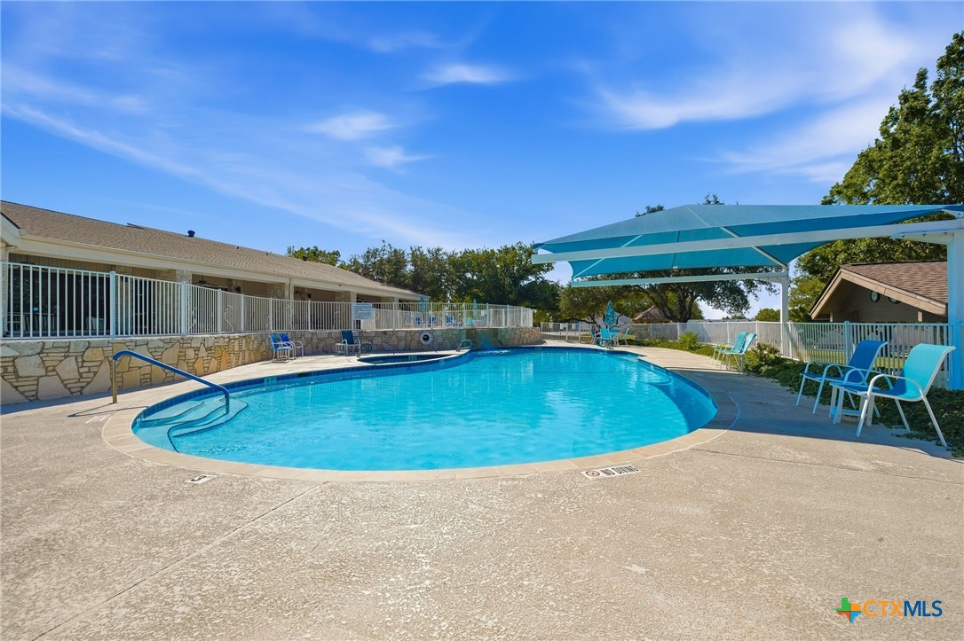 3624 Fox Run Schertz, TX 78108 - Photo 38 of 46 a view of a swimming pool with an outdoor seating