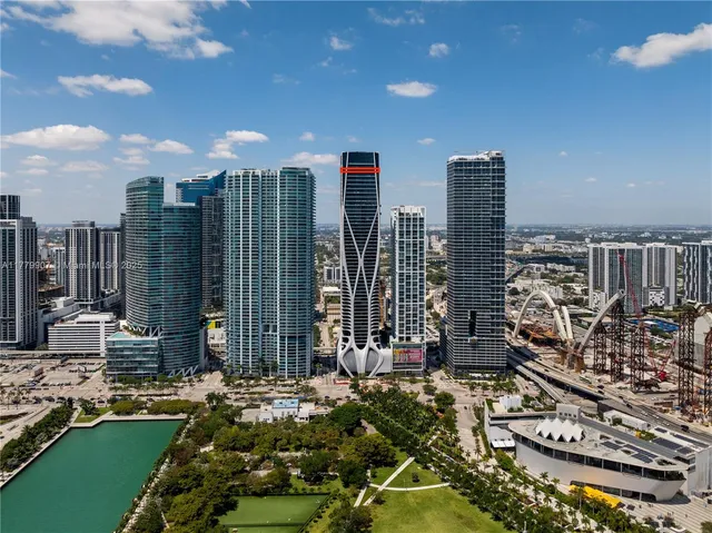 a view of a city with tall buildings