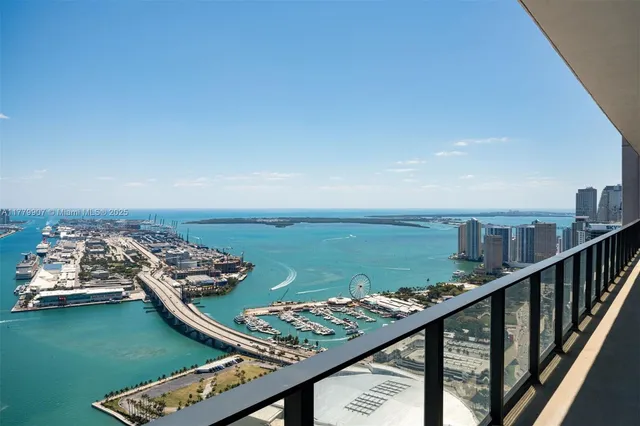 a view of a balcony with an ocean view